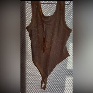 Nude color bodysuit with diamonds